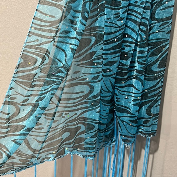 Sheer blue zebra print scarf very lightweight. Fringe trimmed. 100% Polyester - Picture 3 of 4
